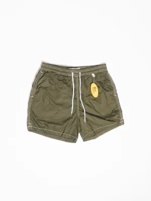 Green swim shorts